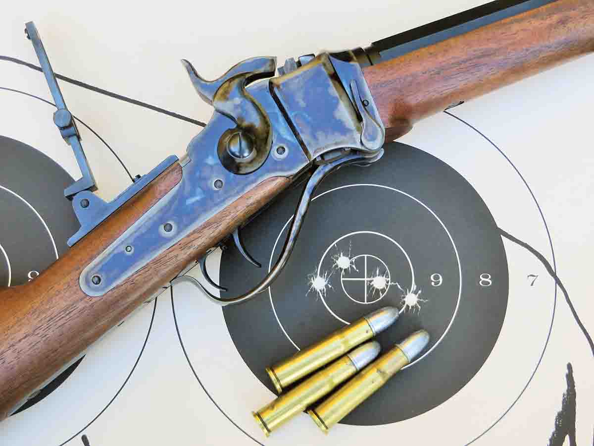 Five-shot group fired using the Buffalo Hunter Sporting Tang Sight. Far left hole is a double.